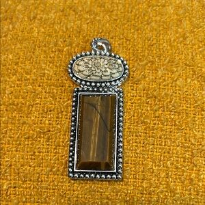 Silver and Gold Pendant with Floral Design